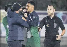  ?? ?? EMOTIONS RUNNING HIGH Scenes after the final whistle at Baffins on Wednesday