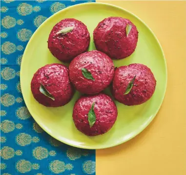  ?? ?? Rukmini Iyer’s recipe for beetroot, curry leaf and ginger brunch buns. David Loftus/PA Photos