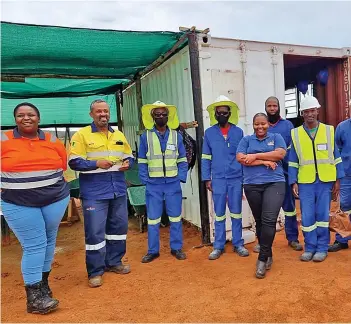  ?? ?? Sanna Sebone, who founded Sibonge Constructi­on in 2018, proudly shows off her employees.