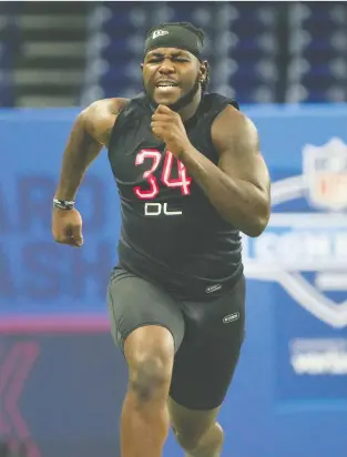  ?? KIRBY LEE/USA TODAY SPORTS ?? Penn State defensive lineman Jesse Luketa, shown here running the 40-yard dash during the 2022 NFL scouting combine, was picked in the final round of the NFL draft by the Arizona Cardinals.