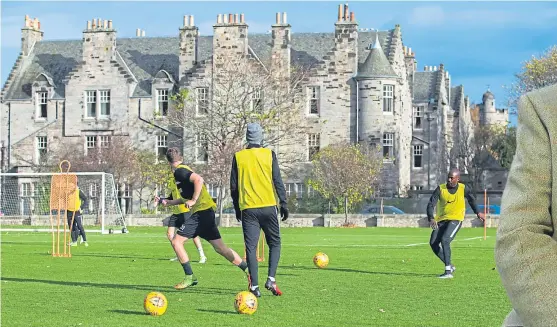  ?? Picture: SNS Group. ?? Dundee United train at their base in St Andrews – but is it really a huge advantage?