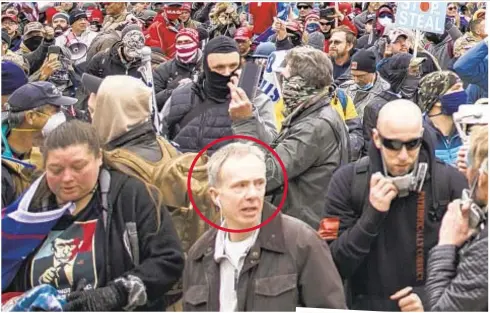  ?? ?? John O’Kelly is among the hundreds of pro-Donald Trump supporters caught on camera storming the Capitol and fighting with police (right) Jan. 6, 2021.