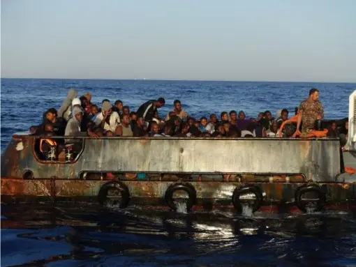  ??  ?? Migrants on a Libyan coastguard boat off the coast of Zuwiyah in September 2016