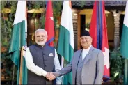  ?? IANS ?? Prime Minister Narendra Modi and his Nepalese counterpar­t K.P. Oli in Kathmandu, Nepal on Friday.