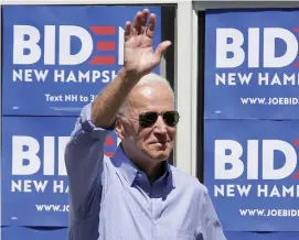  ?? MARY SCHWALM PHOTOS / BOSTON HERALD ?? DIG AT DEMS: Democratic presidenti­al candidate and former Vice President Joe Biden waves, above, and addresses a question from the audience, below, at a house party campaign stop Saturday in Atkinson, N.H.
