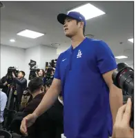  ?? (AP/Lee Jin-man) ?? Shohei Ohtani of the Los Angeles Dodgers arrives to a news conference Saturday before the team’s workout at the Gecheck Sky Dome in Seoul, South Korea. The Dodgers will open the season with two games against the San Diego Padres in Seoul on Wednesday and Thursday.