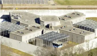  ?? BOSTON HERALd FiLE ?? LOCKED UP: MCI-Cedar Junction is seen from the air in 2015. The prison will close in three parts over the next two years.