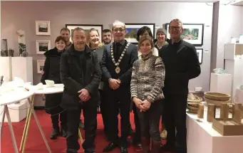  ??  ?? Guests and artists join Chamber President Des Faul for the offical opening of Sligo’s Christmas Pop Up Shop