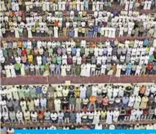  ??  ?? Worshipper­s perform the qiyam prayer outside the Grand Mosque on the 27th night of this past Ramadan.