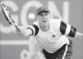  ?? Jan Kruger Getty I mages ?? SAM QUERREY of the U. S. is in action against Pablo Cuevas of Uruguay during the Aegon Open at Nottingham. Querrey lost to Dennis Istomin in the f inal.