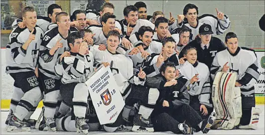  ??  ?? Members of the NKEC Titans hold the regional banner March 9 in Berwick after winning the final 4-2 over Yarmouth.