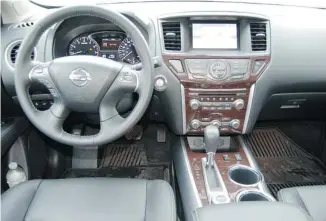  ?? PHOTOS: MCNAUGHTON/POSTMEDIA NEWS ?? Inside, the Pathfinder is uncluttere­d and logical with dual-zone climate control and heated steering wheel.