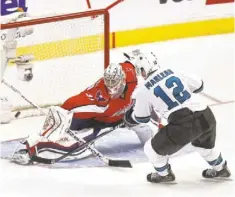  ?? GEOFF BURKE, USA TODAY SPORTS ?? The Sharks’ Patrick Marleau scores against the Capitals’ Philipp Grubauer during a January shootout.