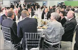  ?? Sputnik/mikhail Klimentyev/kremlin via Reuters ?? Flynn sits to the right of President Vladimir Putin (centre, facing camera) at a dinner to mark the 10th anniversar­y of Russia’s propaganda TV channel RT in Moscow on December 10, 2015.