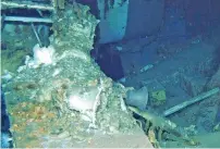  ?? USS Indianapol­is, AP ?? The wreckage of the including the ship’s bell, at the bottom of the North Pacific Ocean. —