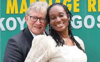  ?? ?? The Wedding Ceremony between the former Miss Ikhazuangb­e Veronica and Mr. Robertson Stewart Neville Struan held at Federal Marriage Registry , Ikoyi in Lagos, Nigeria …. recently SUNDAYADIG­UN