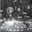  ?? PIC: AFP ?? Iranians light candles for the victims of Ukraine Airlines Boeing 737.