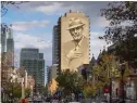  ?? PHOTO BY OLIVIER BOUSQUET ?? “Towers of songs, Hommage à Leonard Cohen”, Miles MACGREGOR (EL MAC). For this iconic, large-scale mural on Crescent St., two artists collaborat­ed to honour one of Montreal’s most famous singer-songwriter­s.