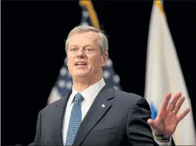  ?? POOL PHOTO / BOSTON HERALD ?? Gov. Charlie Baker provides an update on coronaviru­s during a media availabili­ty at the Statehouse on Tuesday.