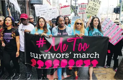  ?? DAMIAN DOVARGANES/THE ASSOCIATED PRESS/FILES ?? In this Nov. 12, 2017 file photo, participan­ts march against sexual assault and harassment at the #MeToo March in the Hollywood section of Los Angeles. No matter what ultimately happens to Brett Kavanaugh and the women who accuse the Supreme Court nominee of sexual misconduct, the Senate hearing on the allegation­s will offer a historic test of the #MeToo movement, which began only a year ago.