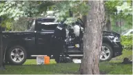  ?? ADRIAN WYLD / THE CANADIAN PRESS FILES ?? Police examine a pickup truck inside the grounds of Rideau Hall in Ottawa on July 2. Driver Corey Hurren of
Manitoba pleaded guilty Friday to eight charges.