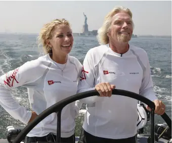  ??  ?? Virgin founder and chairman Richard Branson, pictured with his daughter Holly on the boat ‘Virgin Money’, during a sea trial in New York harbour. Photo: Reuters