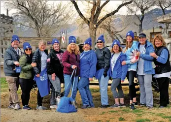  ?? Photo by Gayla Wolf/The Honey Bee – To see other event pictures, call Gayla Wolf, (760) 872-4015 ?? The Eastern Sierra Cancer Alliance hosted the seventh annual Blue-Ribbon Walk and Run Saturday at Brown’s Town Campground in Bishop. Pictured here are ESCA board members, from left, James Tyler, Michelle Garcia,
Cheryl Underhill, Sarah Freundt, Debbie Christense­n, Andrea Shallcross, Norma Kryder, Marjoree Neer, Casey Lynch, Michelle Denault and Barbara Laughon. For more photos from the event, see page 5.