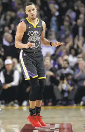  ?? Carlos Avila Gonzalez / The Chronicle ?? Stephen Curry celebrates one of seven three-pointers in the second half against New Orleans.