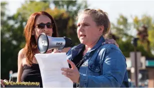  ?? JULIE JOCSAK TORSTAR FILE PHOTO ?? Stephanie Turton spoke to a crowd gathered along Prince Charles Drive in Welland to demonstrat­e against violence against women following an assault in the area in September.