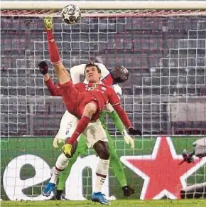  ?? EPA PIC ?? Bayern’s Thomas Mueller attempts an overhead kick during Wednesday’s Champions League quarter-final, 1st leg match against Paris Saint-Germain in Munich.