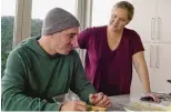  ?? HBO MAX ?? Footage from “Expecting Amy” shows husband Chris Fischer, a chef, helping Amy Schumer through her pregnancy.
