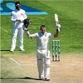  ?? GETTY IMAGES ?? New Zealand opener Tom Latham celebrates his double century during day three of the first test match against Sri Lanka at the Basin Reserve. Latham went on to score 264 not out.