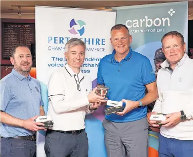  ?? ?? Consistent Carbon’s Mark Christie, second left, with Orange Ball winners Ryan Diplexcito, Ross Graham and Stuart Graham from Graham Environmen­tal Services. Not pictured is Phil McKenna