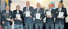  ?? SPECIAL TO THE EXAMINER ?? From left, Les Peoples, Jessie Brown, Bob Fallis, Rob Gordon, Bud Wrightly and Phil Hinds were each honoured with lifetime membership­s in the Royal Canadian Legion Branch 300 at the Norwood Legion's annual awards night on Nov. 4.