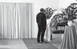  ?? Amr Alfiky / New York Times ?? A man views the body of Andrew Brown Jr. on Sunday at Horton’s Funeral Home in Hartford, N.C. Brown, 42, was shot and killed by police April 21.