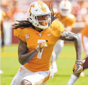  ?? STAFF PHOTO BY ROBIN RUDD ?? Tennessee’s Marquez Callaway looks to block downfield during a game against UMass last September. Marquez is expected to play a key role for the Vols at the receiver spot this season.