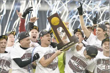  ?? DERIK HAMILTON — THE ASSOCIATED PRESS ?? Members of the Stanford soccer team celebrate after winning the NCAA College Cup title match vs. Indiana on Sunday.