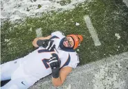  ??  ?? Left offensive tackle Garett Bolles leaves some Broncos fans cold after several seasons of disappoint­ing play and numerous holding penalties.