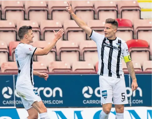  ??  ?? THE EQUALISER: Paul Watson, left, congratula­tes Euan Murray after his goal made it 1-1 against Inverness Caley.