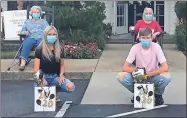  ?? Contribute­d ?? High school seniors Haley Williams and Davis Kilpatrick received gift bags from Juanita Henry and Jane Ledbetter.