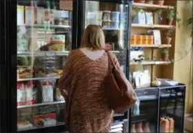  ??  ?? Tammy Stamm, of Reading, shops at the all-vegan grocery store, the Firefly Café Outpost, located in Boyertown. Stamm enjoys being able to eat at the café restaurant then shopping at the outpost which is located right next door.