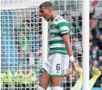  ?? ?? Moritz Jenz heads for the Celtic fans after scoring at Dingwall