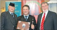  ??  ?? Overall winner Angus MacColl with Rod Macleod from Calgary, left, and Kenny Dan Macdonald, from Point and Sandwick Trust.