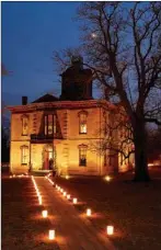  ?? Submitted photo ?? Luminarias light up the night at Historic Washington State Park. The park celebrates its 29th annual Christmas and Candleligh­t event tomorrow and Saturday, Dec. 12.