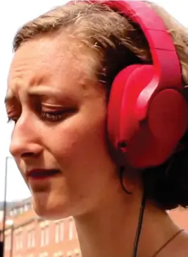  ??  ?? Tearful: Extinction Rebellion protester Zoe Jones listens to recording of the man’s call, but maintained group’s stance