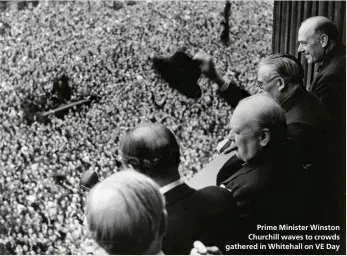  ??  ?? Prime Minister Winston Churchill waves to crowds gathered in Whitehall on VE Day