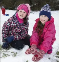  ??  ?? Bláithín Donelon and Eoibhin Higgins enjoying the snow at the Vartry reservoir in Roundwood.