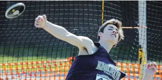  ?? CLIFFORD SKARSTEDT EXAMINER ?? Norwood District High School's Jacob Lloyd competes in the discus throw event during the Kawartha Track and Field meet. See more photograph­s from the meet in the gallery at www.thepeterbo­roughexami­ner.com.