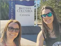  ?? SUBMITTED PHOTO ?? Best friends Angie Arsenault and Chelsea Moulins are on the last leg of a cross-country adventure. Here, they take a photo as they arrive in British Columbia.