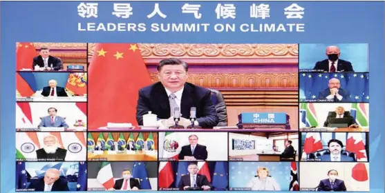 ?? LI XIANG / XINHUA ?? President Xi Jinping addresses the Leaders Summit on Climate via video link from Beijing on April 22. Xi delivered an important speech titled “For Man and Nature: Building a Community of Life Together” at the two-day event hosted by the United States.